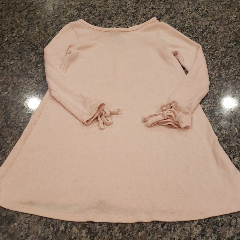 Btween pink dress with rope tie sleeves and